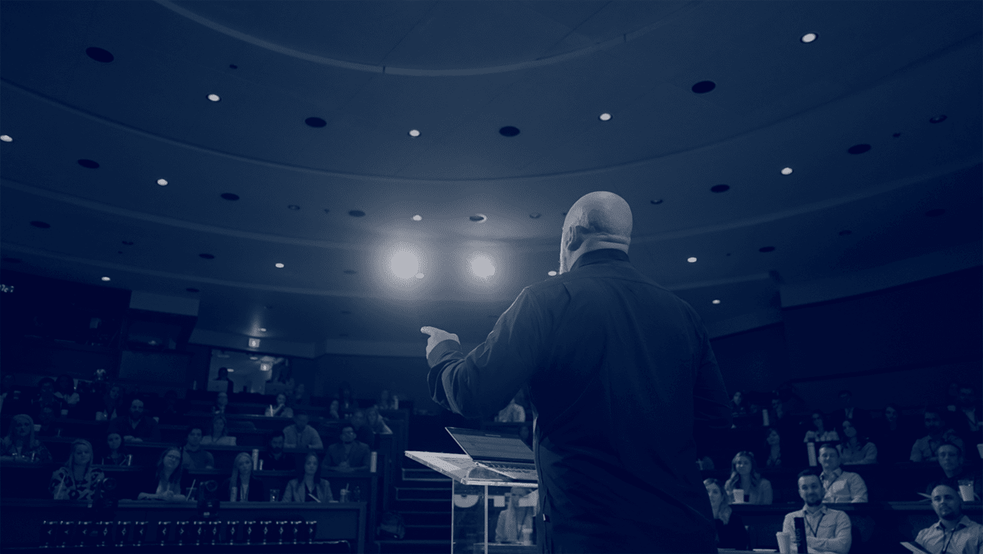Jonathan Reynolds speaking on stage